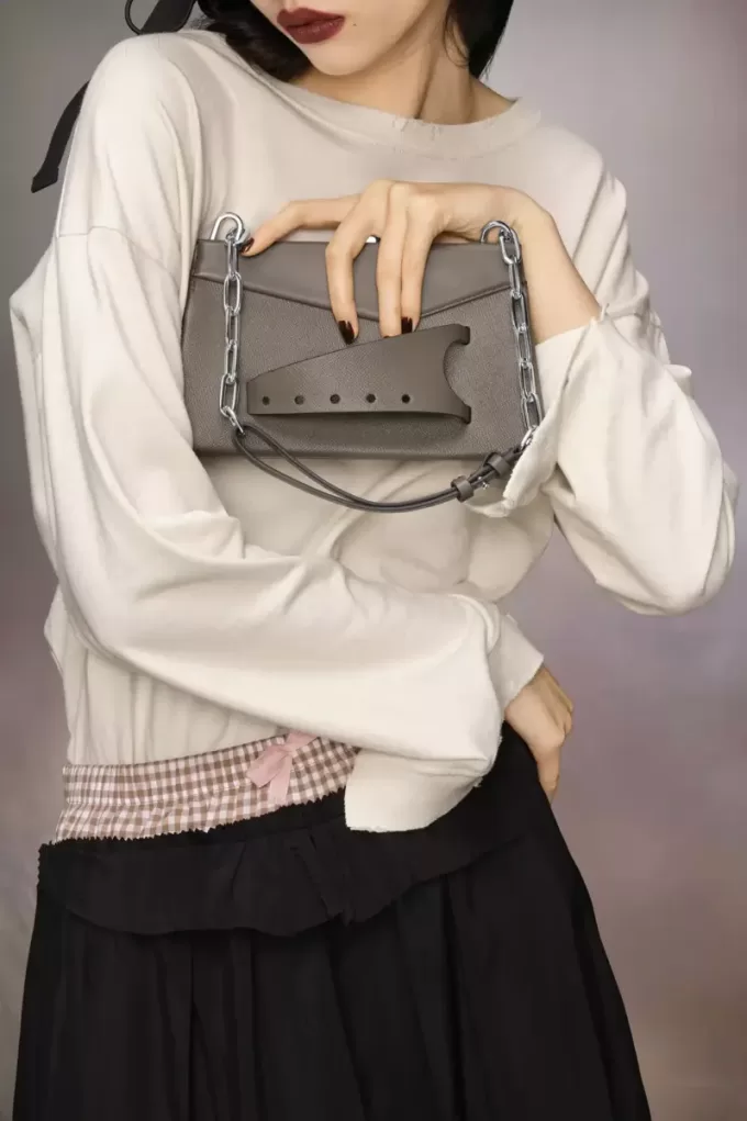 Borsa a tracolla piccola strappata Borsa a tracolla piccola strappata