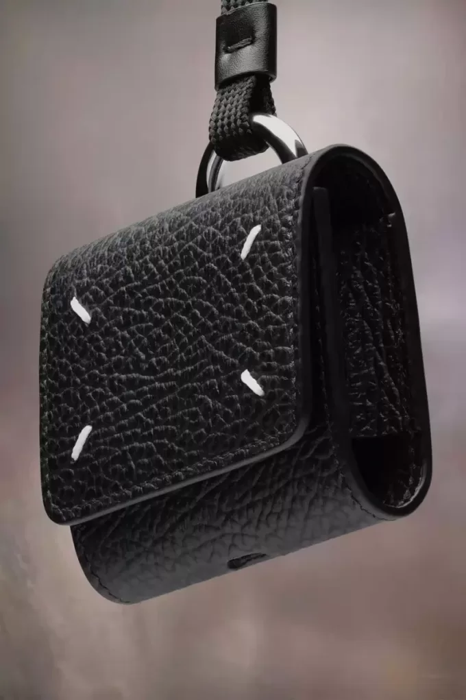 Custodia per AirPod con quattro punti di sutura Custodia per AirPod con quattro punti di sutura