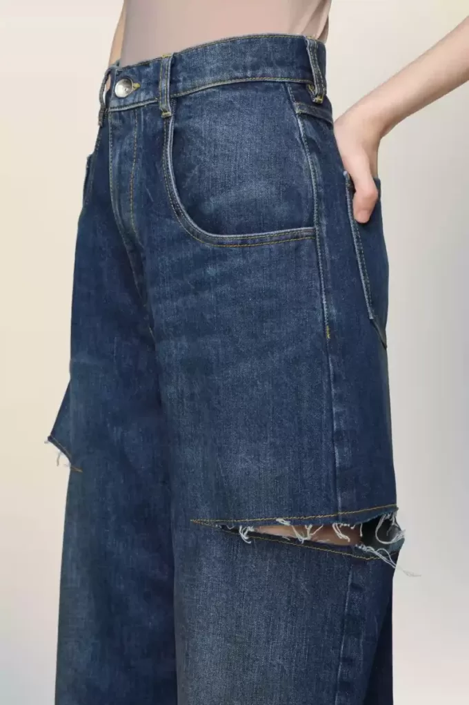 Jeans con tagli Maison Margiela Jeans con tagli Maison Margiela
