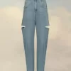 Jeans in denim con dettagli tagliati Jeans in denim con dettagli tagliati
