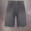 Pantaloncini in denim con borchie Maison Margiela