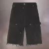 Pantaloncini in denim con borchie Maison Margiela
