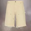 Pantaloncini in denim con borchie Maison Margiela