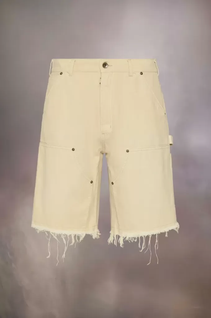 Pantaloncini in denim con borchie Maison Margiela