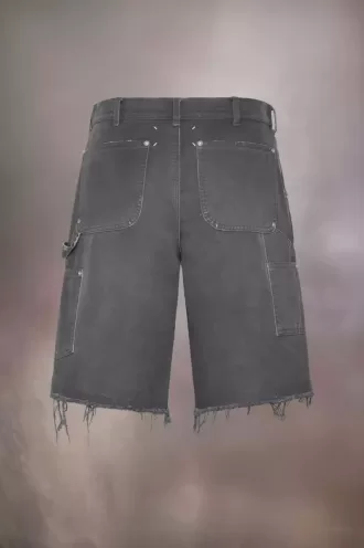 Pantaloncini in denim con borchie Maison Margiela Pantaloncini in denim con borchie Maison Margiela
