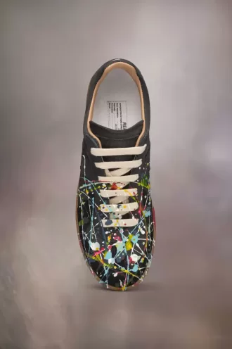 Sneakers replica di vernice